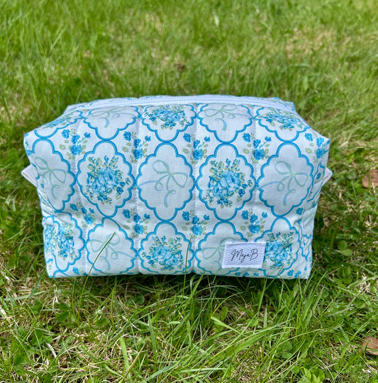 Blue Floral Bow medium makeup bag